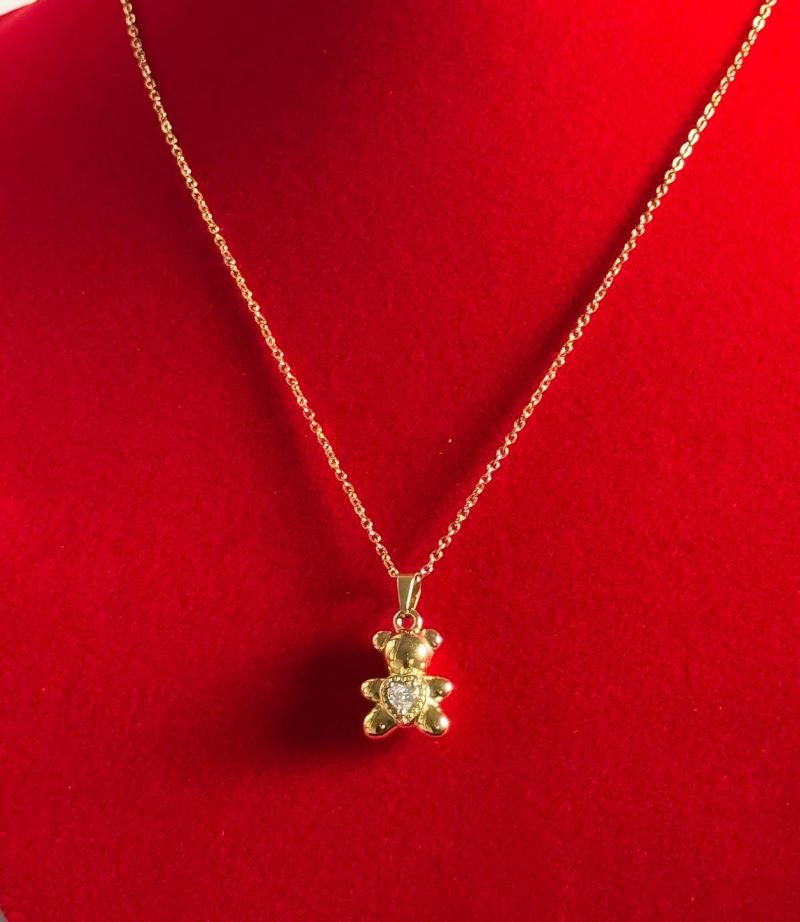 Collana con ciondolo ad orsetto dorato