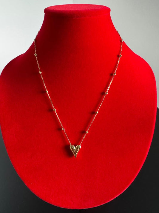 Collana con ciondolo a cuore e sfere